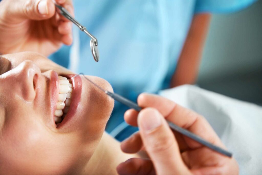 woman getting regular dental checkup